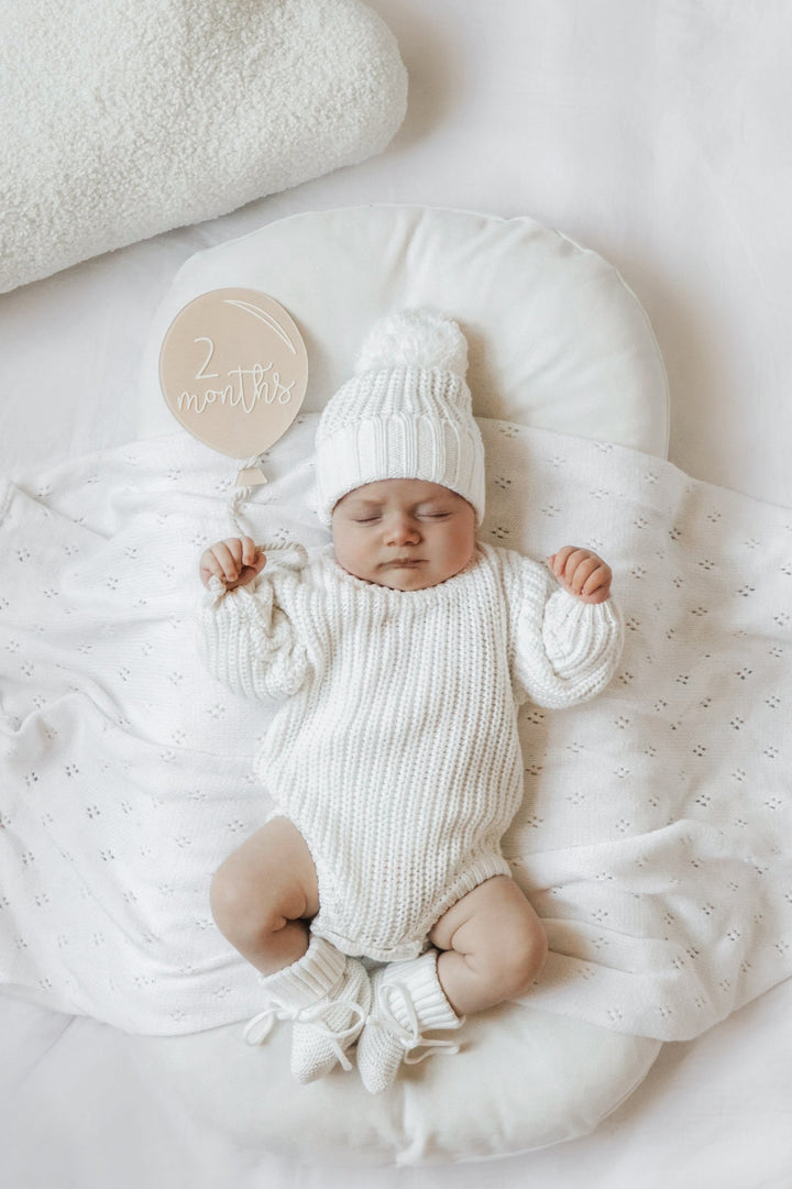 baby white knitted long sleeve romper
