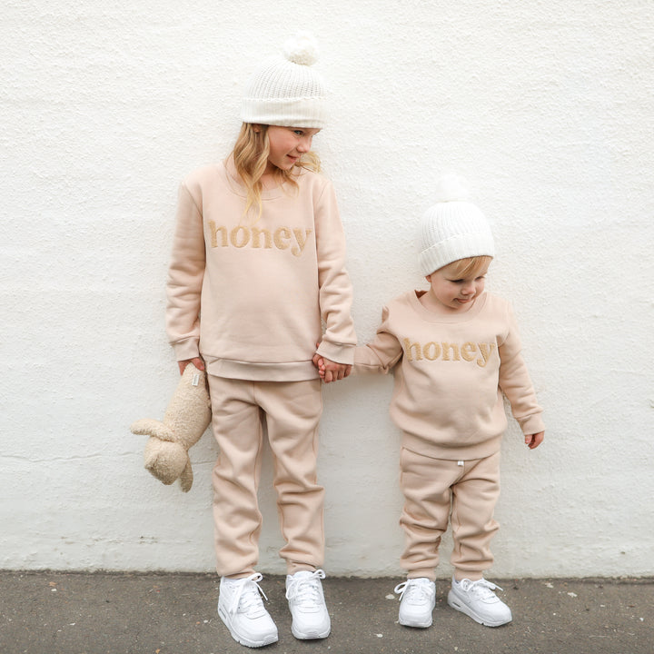 kids unisex oatmeal jumper with honey text