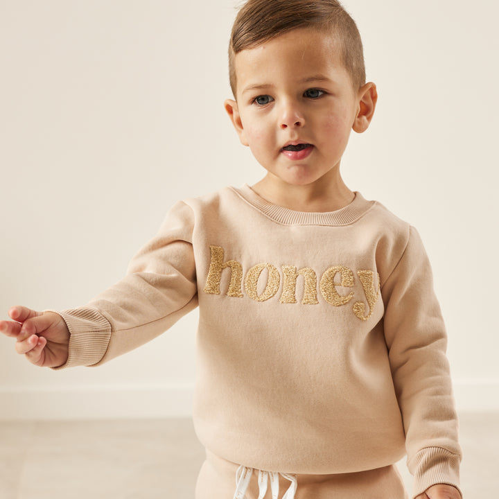 kids unisex oatmeal jumper with honey text
