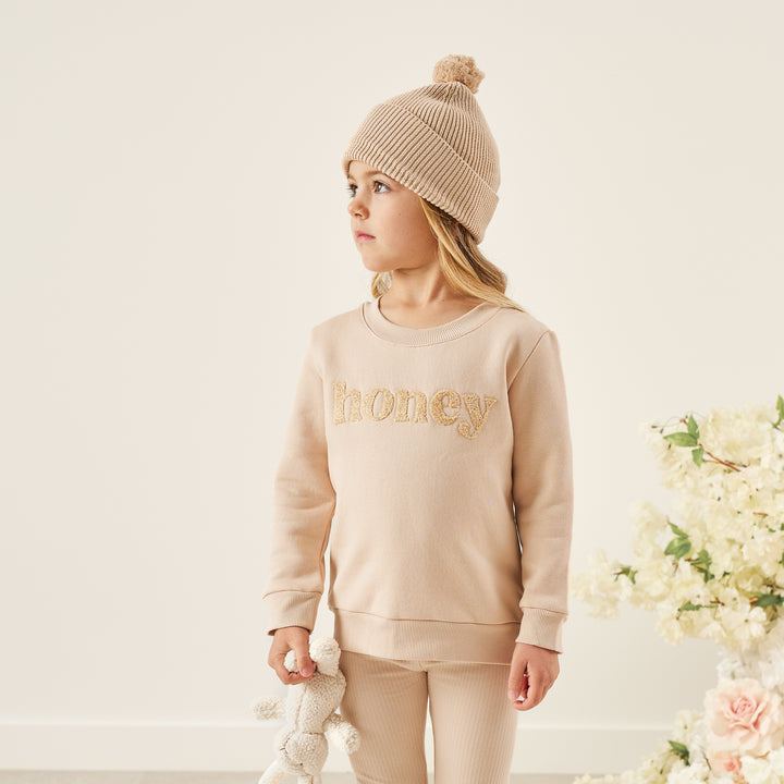 kids unisex oatmeal jumper with honey text