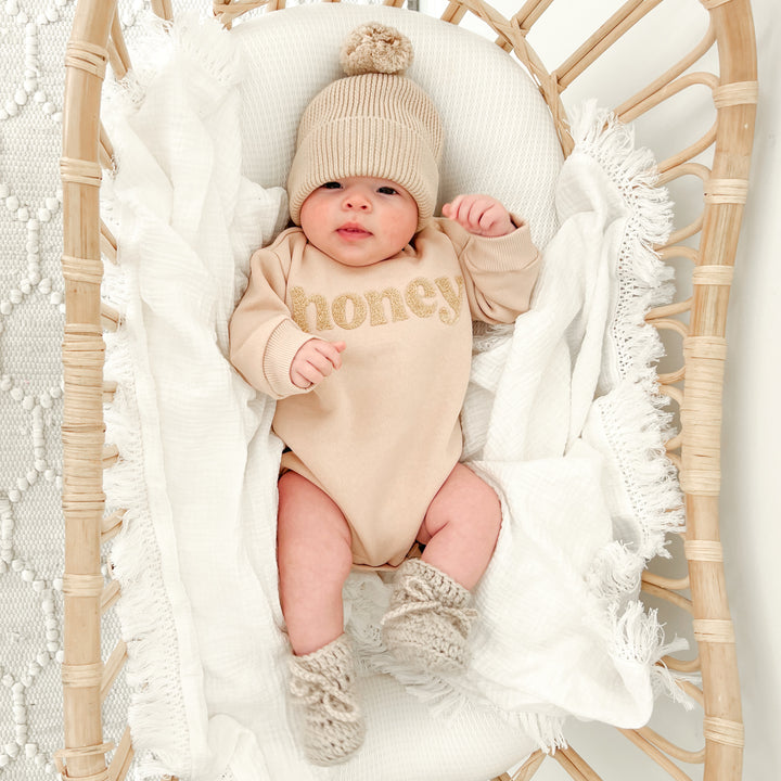 unisex baby oatmeal romper with honey text