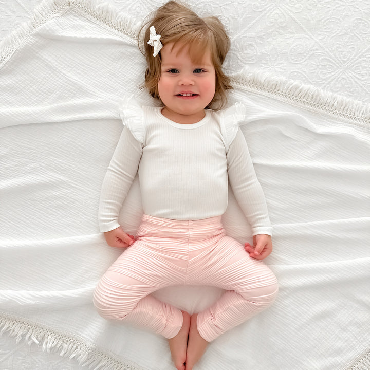 baby girl white long sleeve bodysuit with flutter