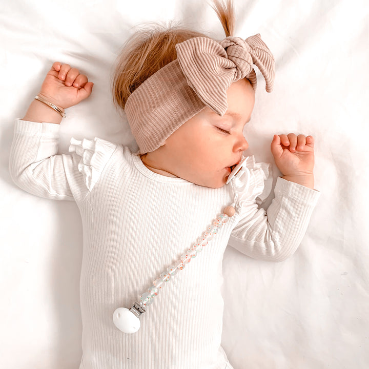 baby girl white long sleeve bodysuit with flutter