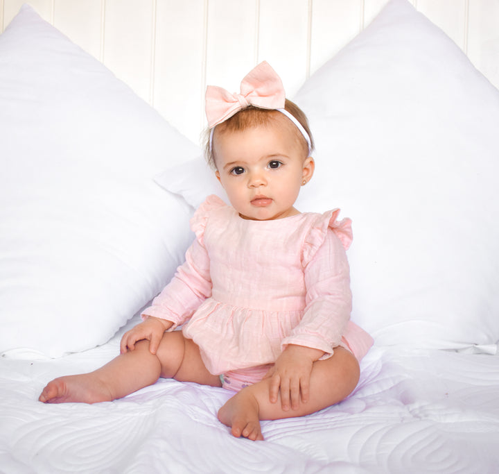 baby girl peach muslin long sleeve romper