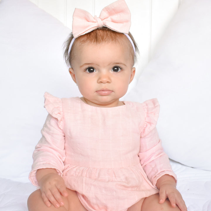 baby girl peach muslin long sleeve romper
