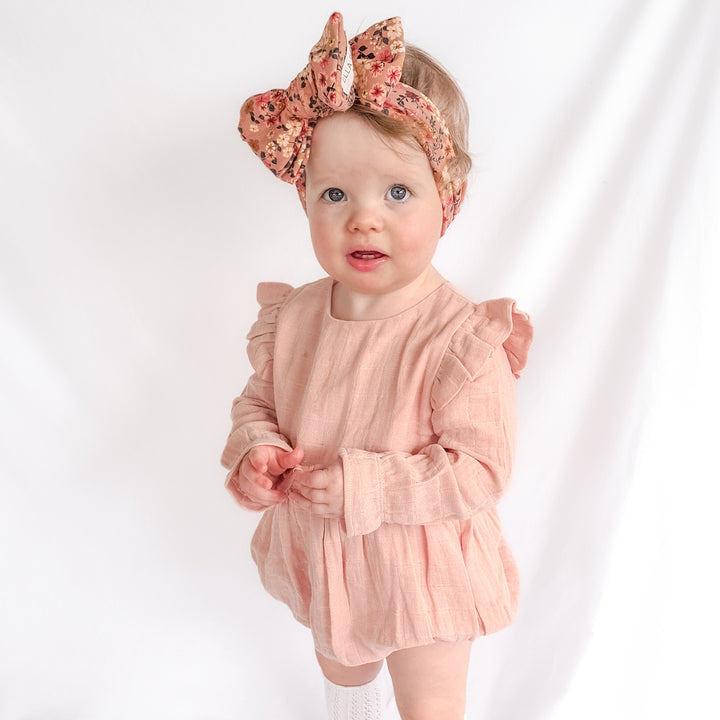 baby girl vintage pink muslin long sleeve romper