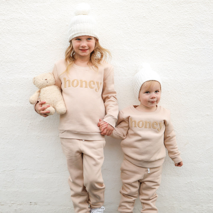 kids unisex oatmeal jumper with honey text