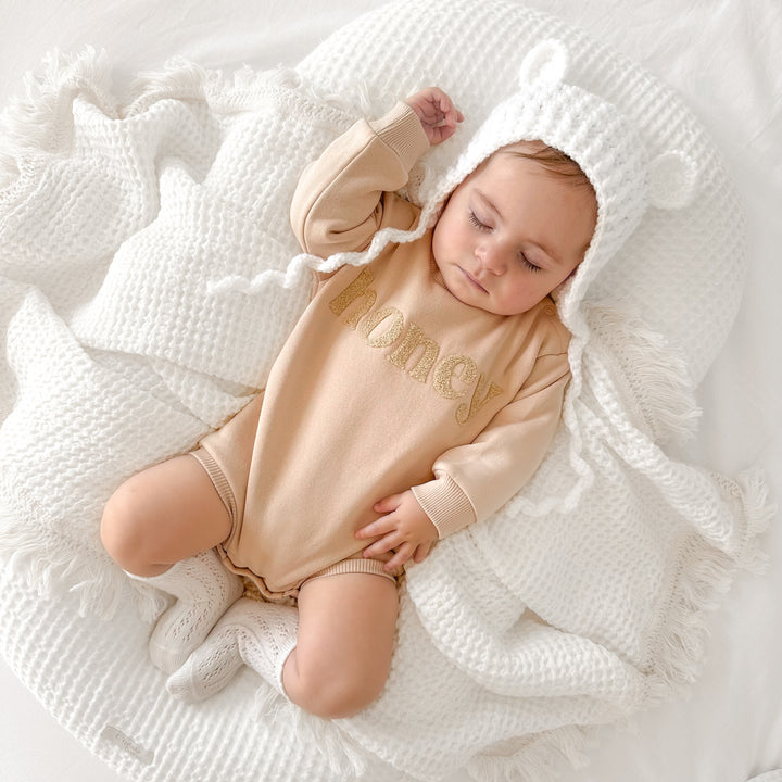 unisex baby oatmeal romper with honey text