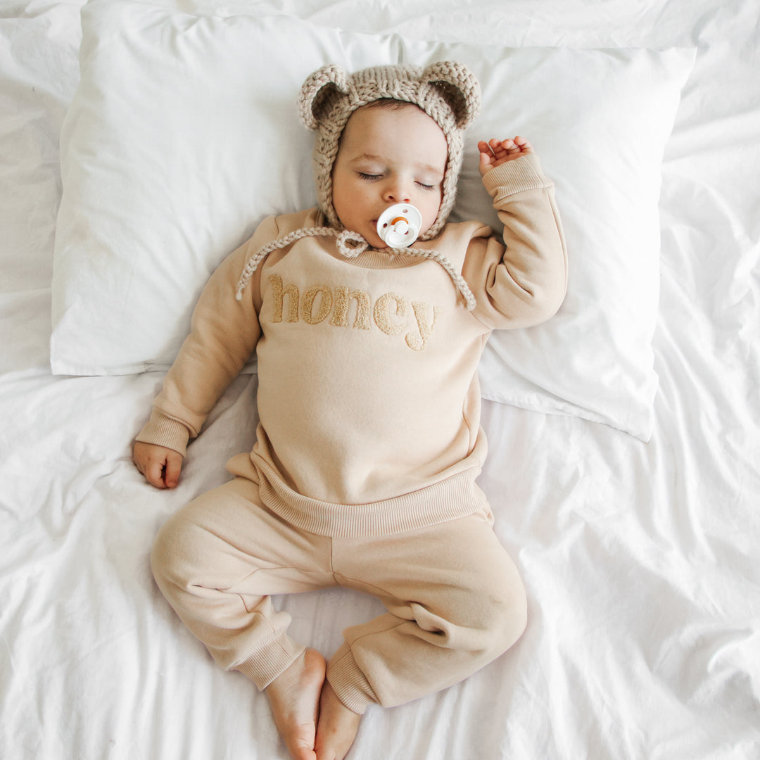 kids unisex oatmeal jumper with honey text