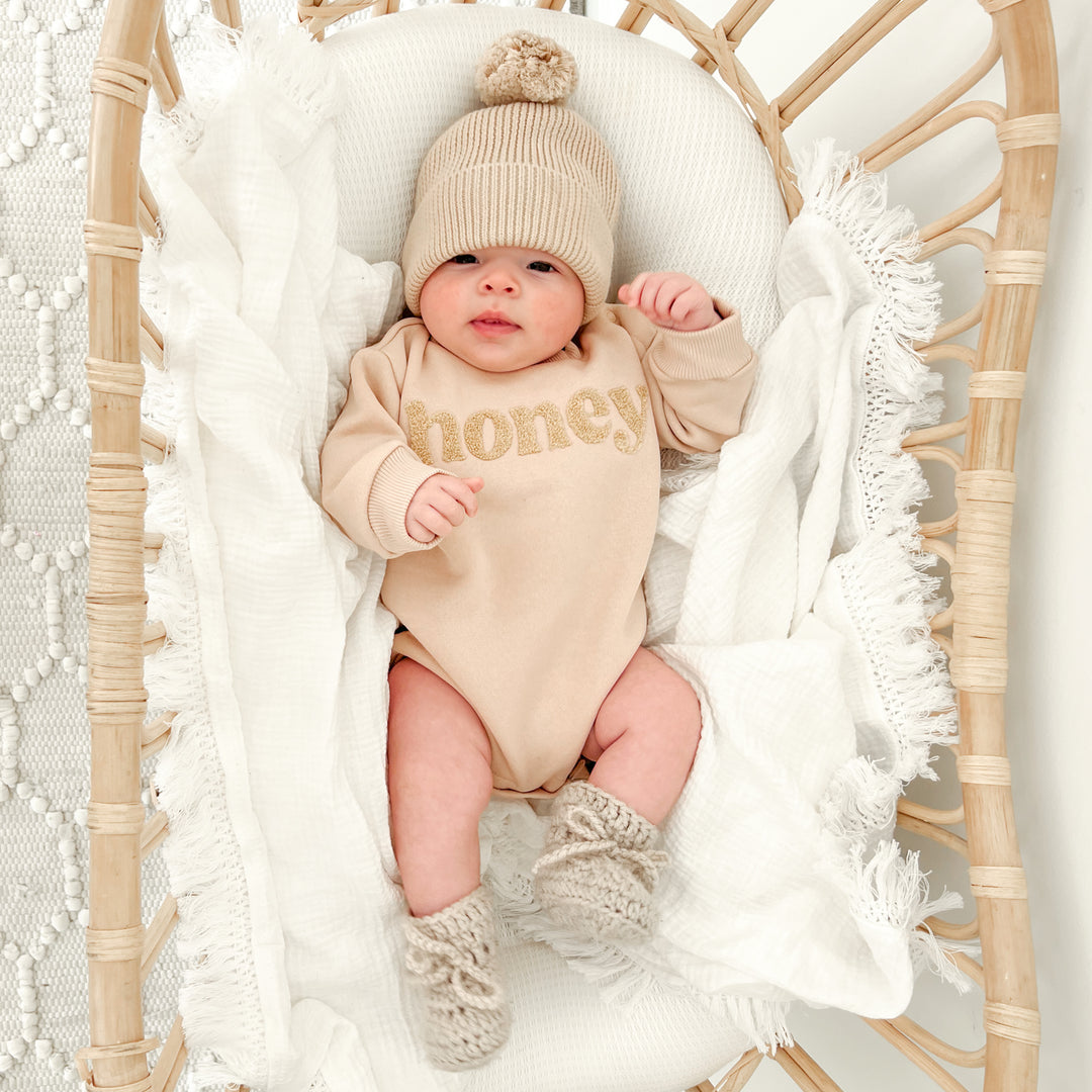 unisex baby oatmeal romper with honey text