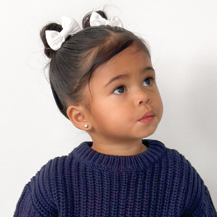 baby girls white mini bow clip