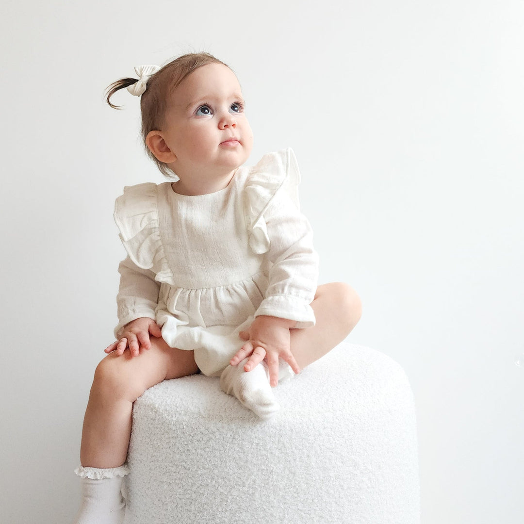 baby girl white long sleeve muslin romper with frill
